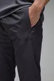 Man Active Shower Resist Buckle Tapered Jogger